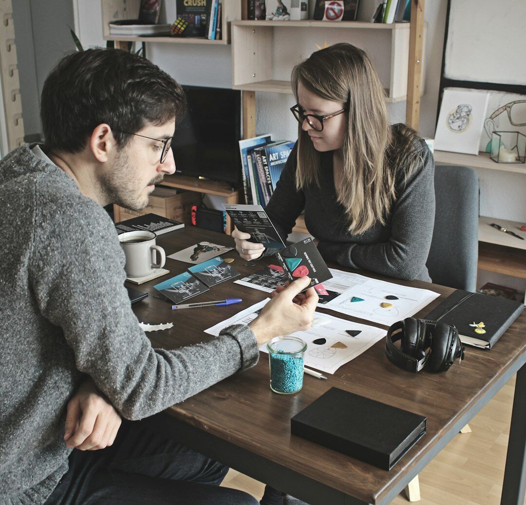 Diverse editorial team collaborating around a table