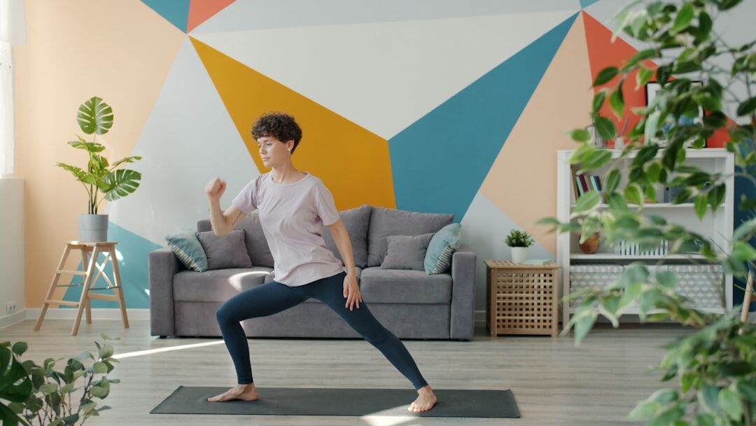 woman doing yoga at home