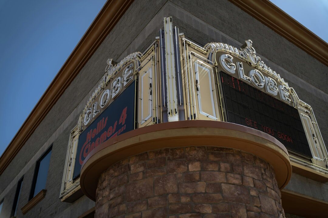 Illuminated facade of a historic theater at night