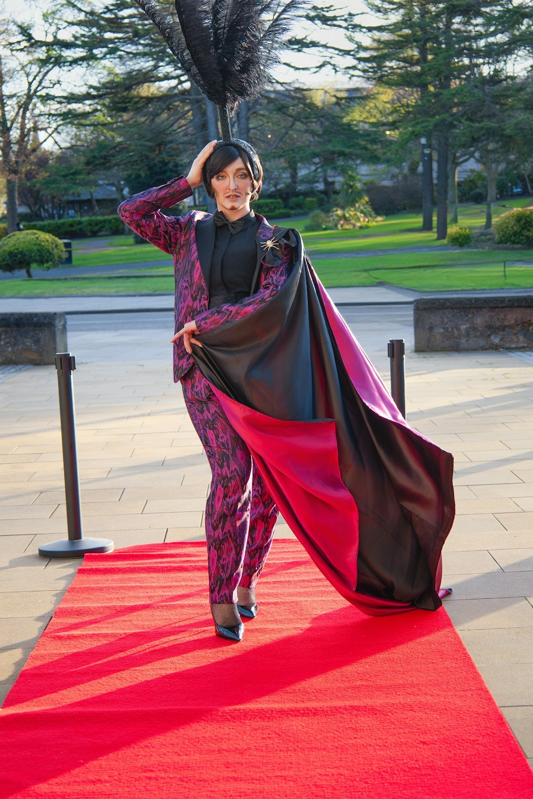 Candid photograph of guests arriving at a red carpet event